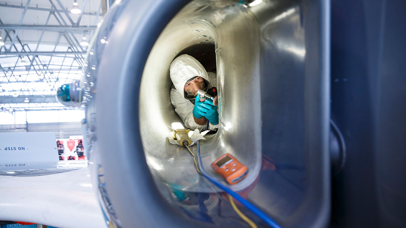 A BAE Systems employee working on a defence aircraft