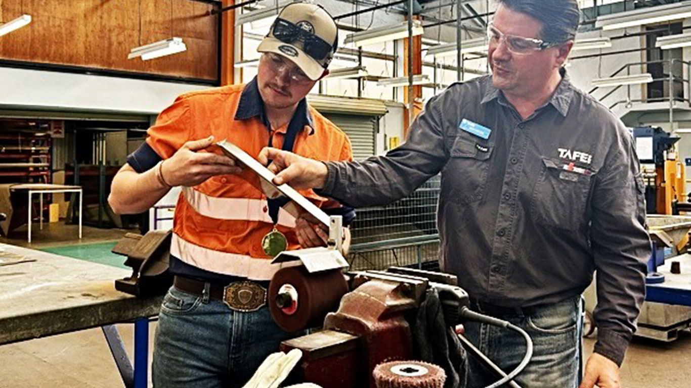 TAFE apprentices working